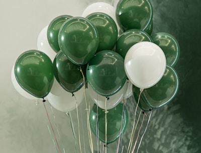 green and white balloons