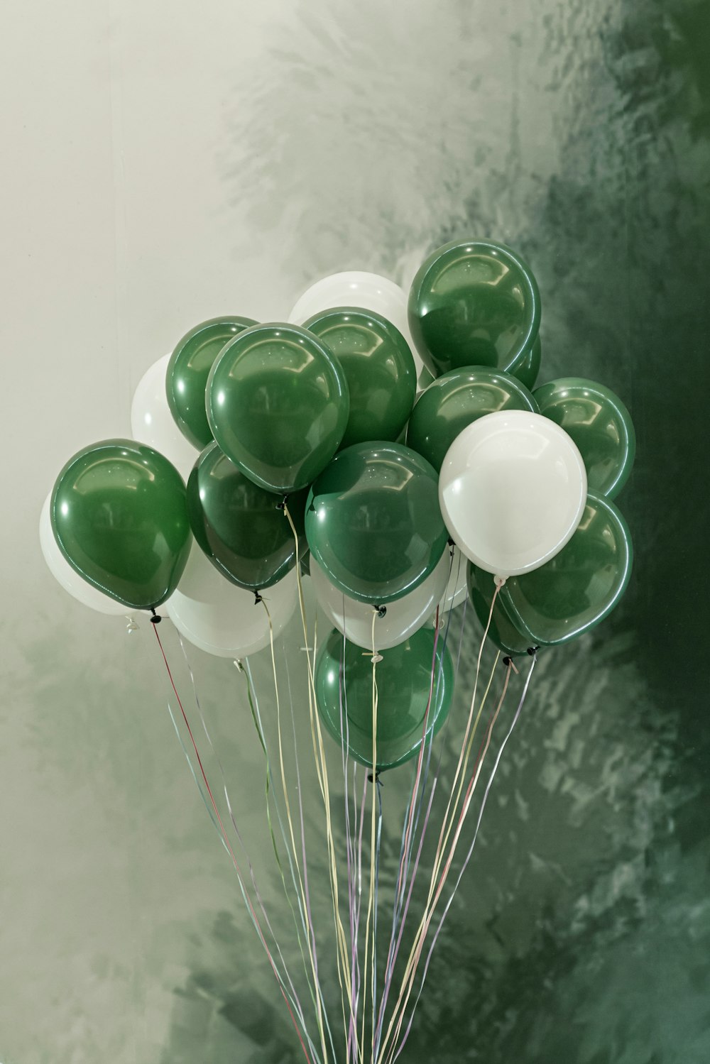 green and white balloons