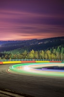 A vibrant screenshot of a futuristic racing game track.