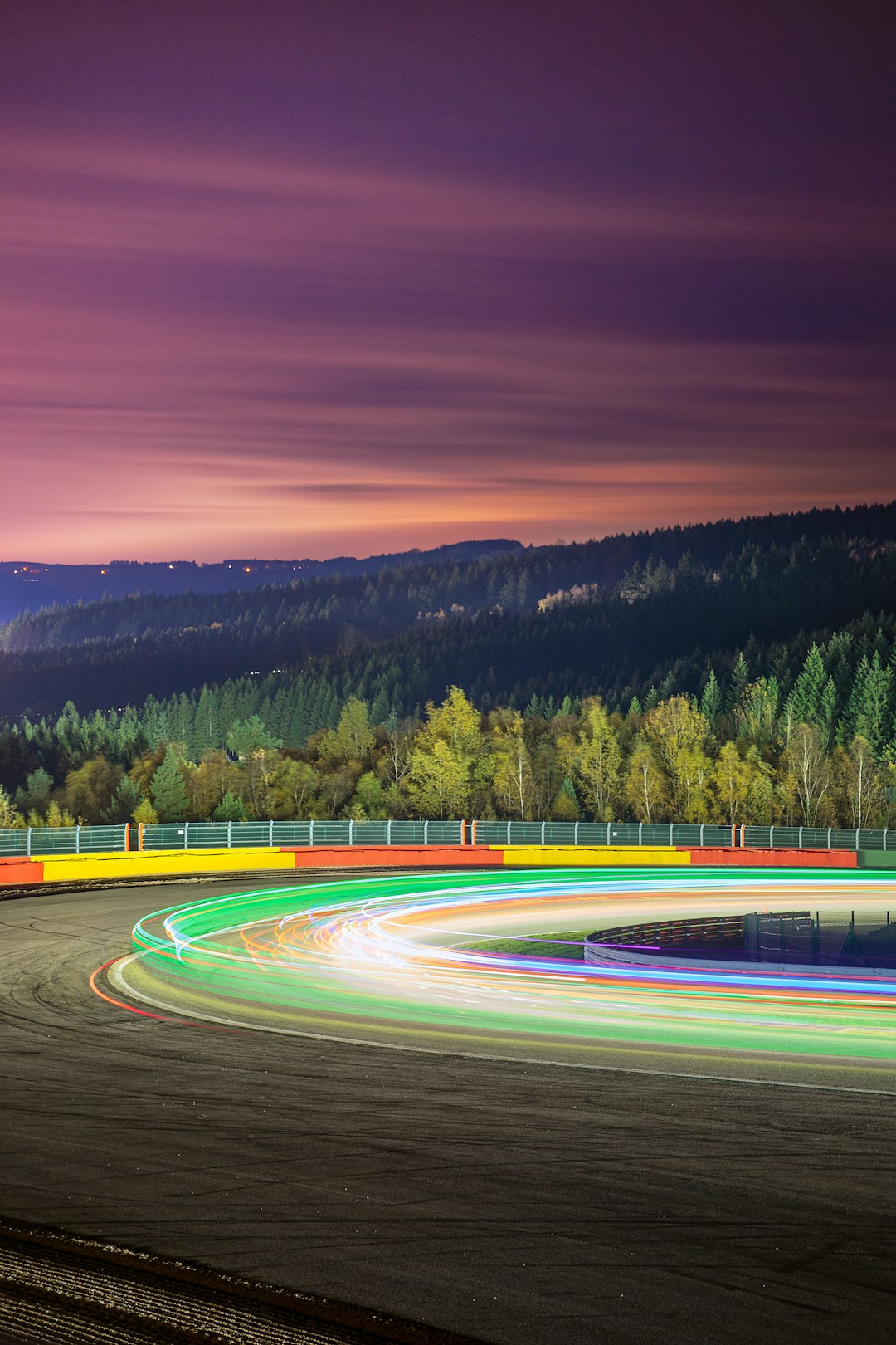 Beautiful light trails - Long exposure at night on the circuit of Spa-Francorchamps in Belgium at the 24h 2CV race 2019.