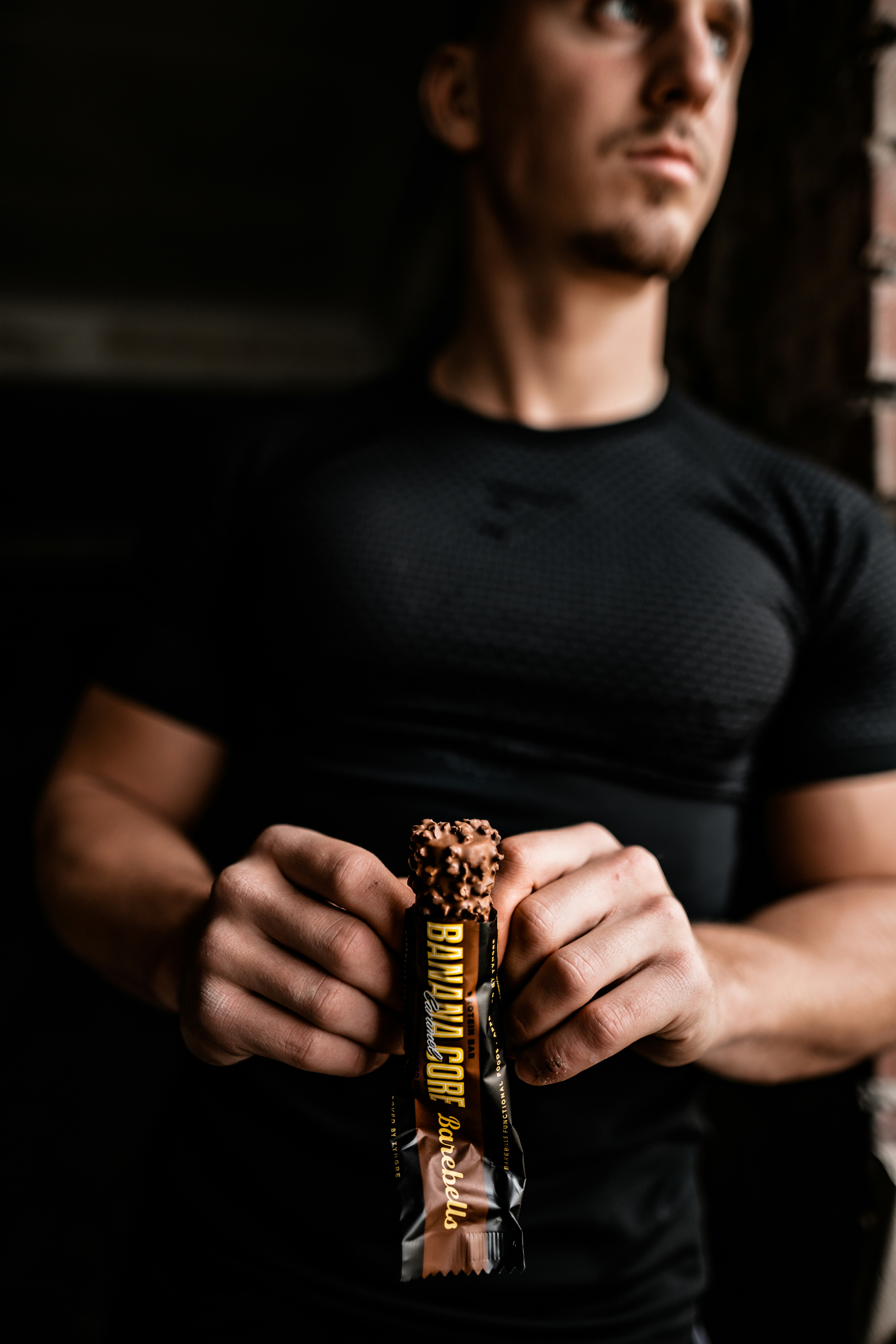 Close-up of an unwrapped chocolate-covered bar (interim image for Shot 9)