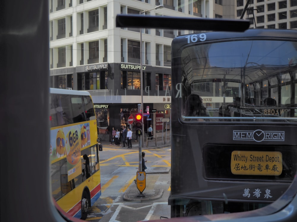 two buses on road