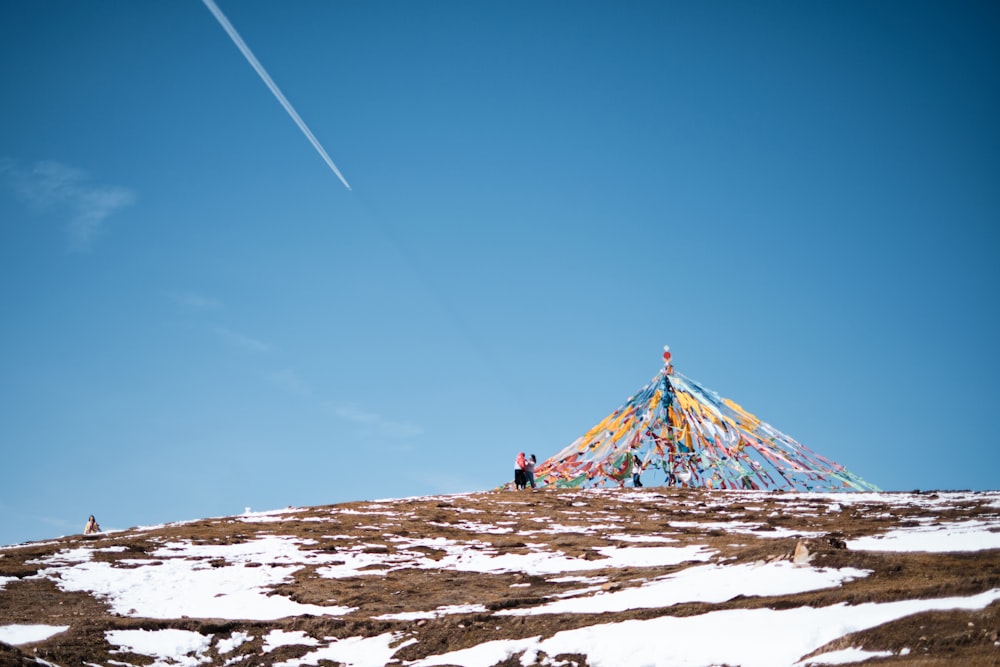 person walking on hill