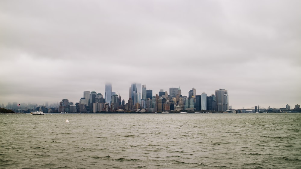 body of water across city buildings