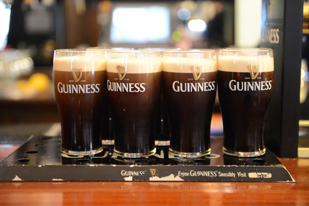 beverage glasses on top of black tray