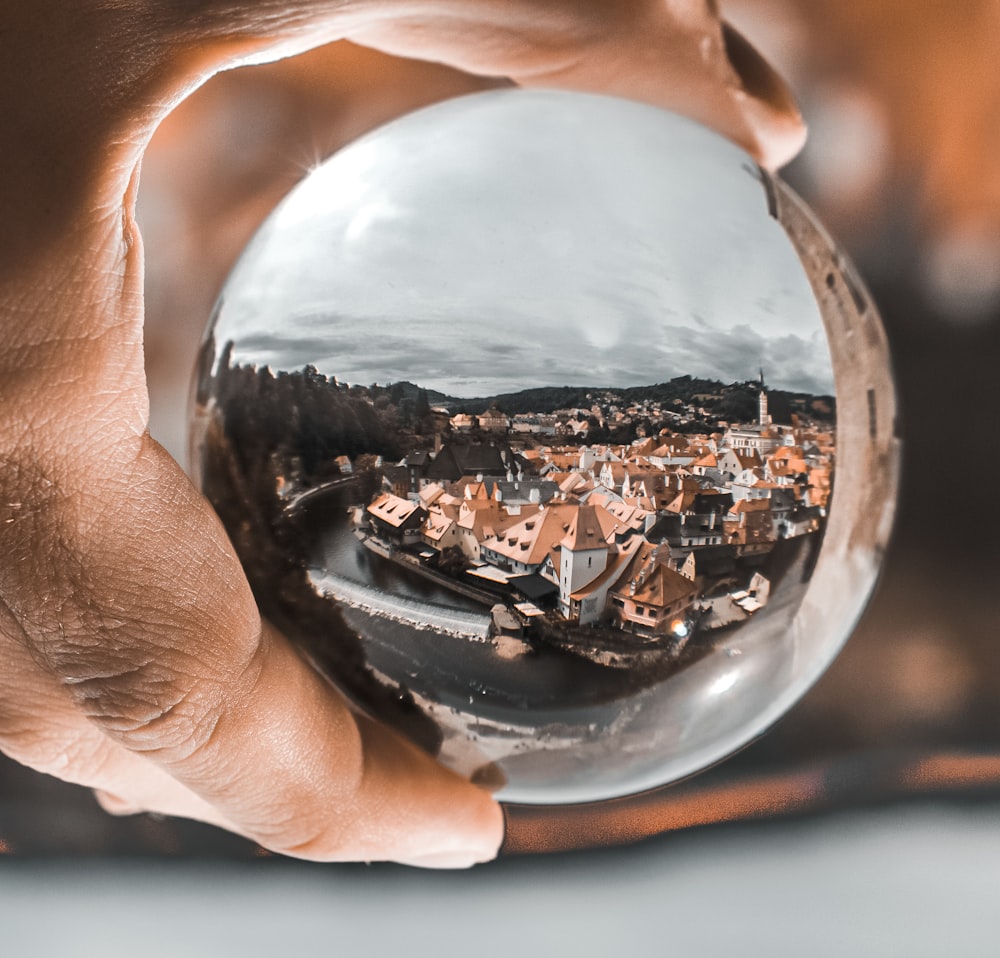 person holding snowball