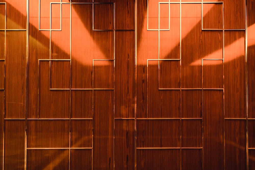 a room with a wooden wall and a clock on the wall