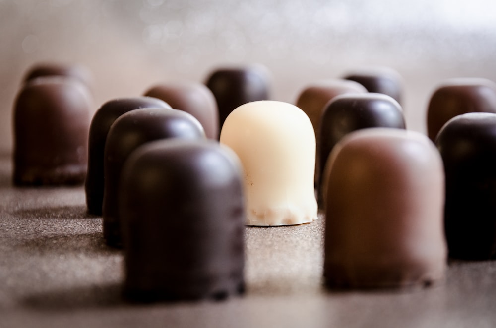 selective focus photo of milk chocolate surrounded by chocolate