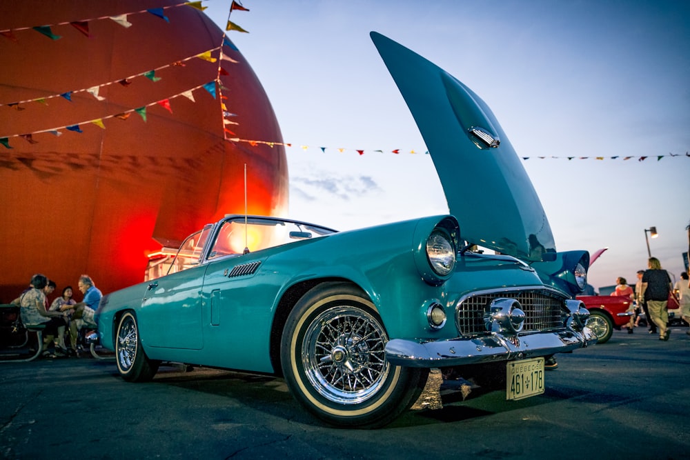 photo of teal classic vehicle