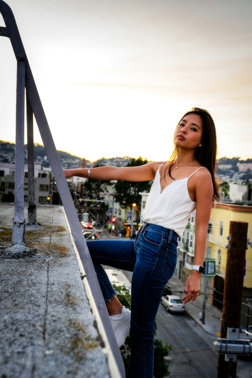 woman climbing on ladder