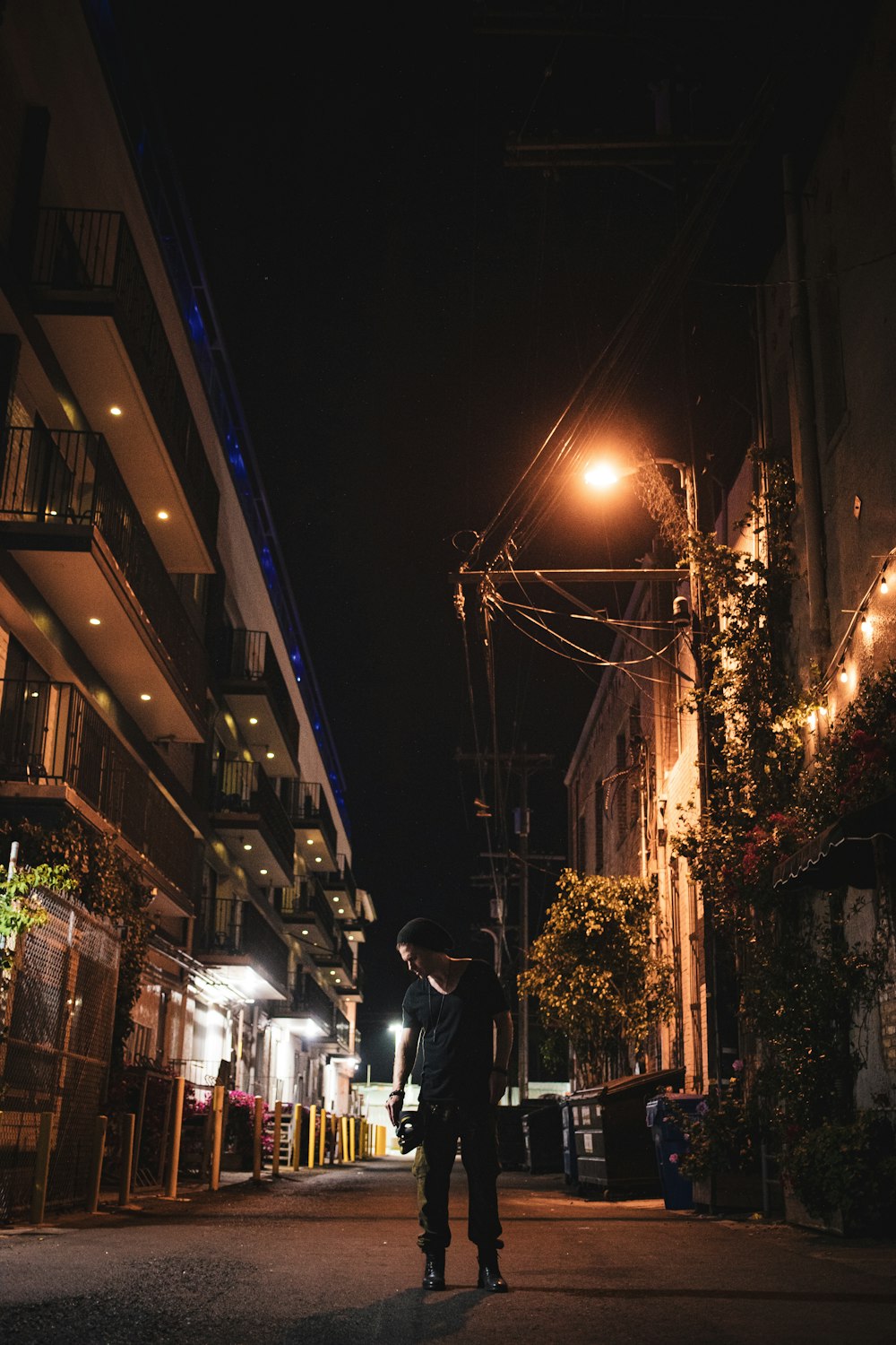 man on road at night