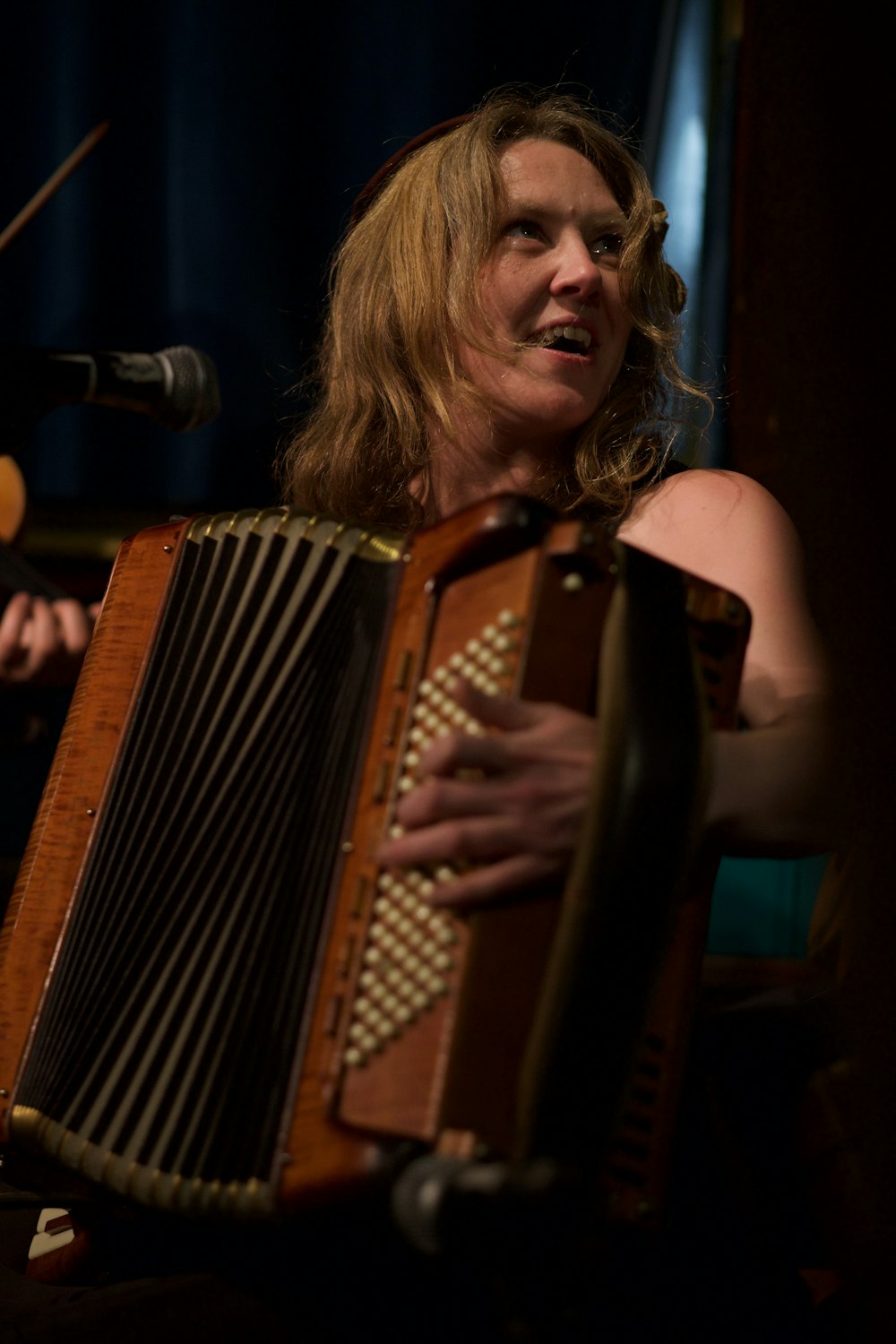 woman playing accordion