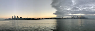 A wide shot of the city skyline at dusk, reflecting Horizontas’ connection to the urban pulse.