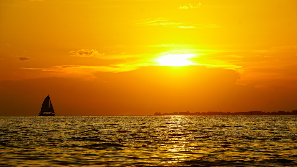 silhouette photography of sailing boat