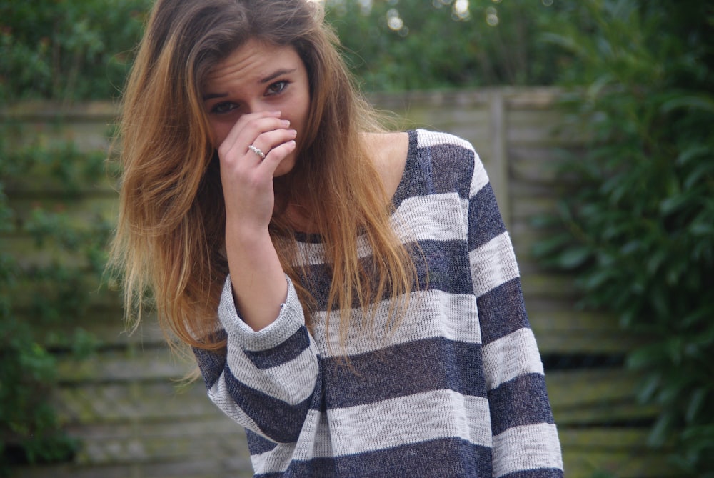 women's gray and blue striped shirt