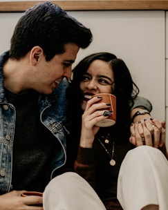 man and woman laughing