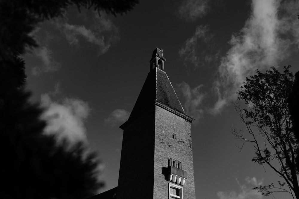 concrete building grayscale photo