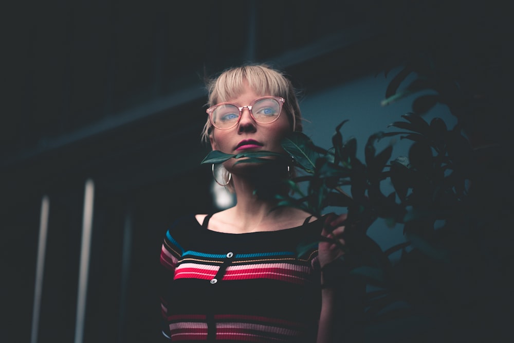 woman in black, pink, and blue boat-neck top