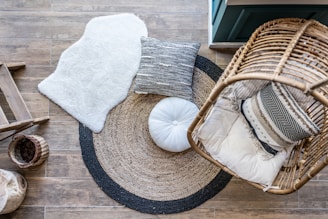 pillows on floor near swing