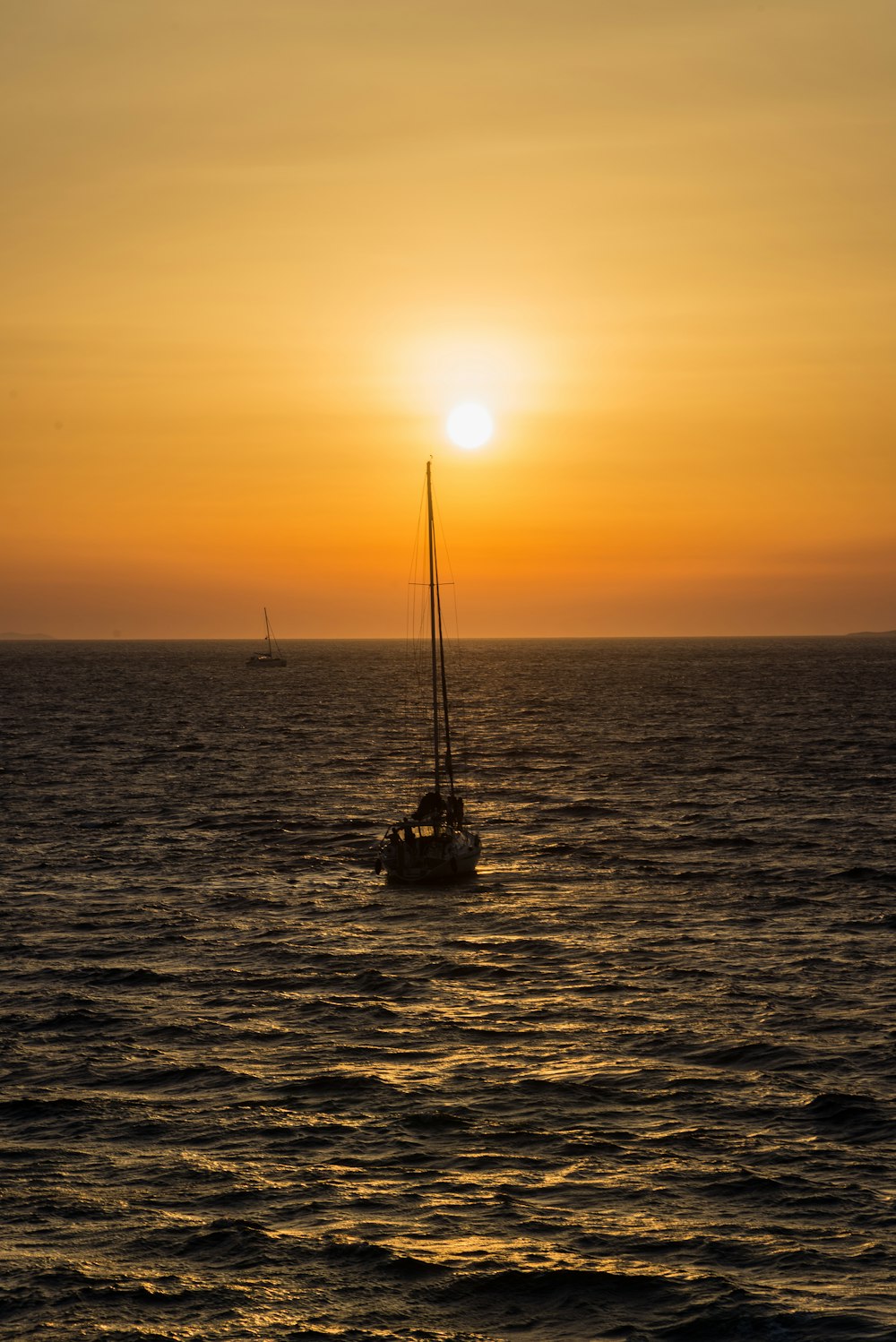 boat on sea at golden hour