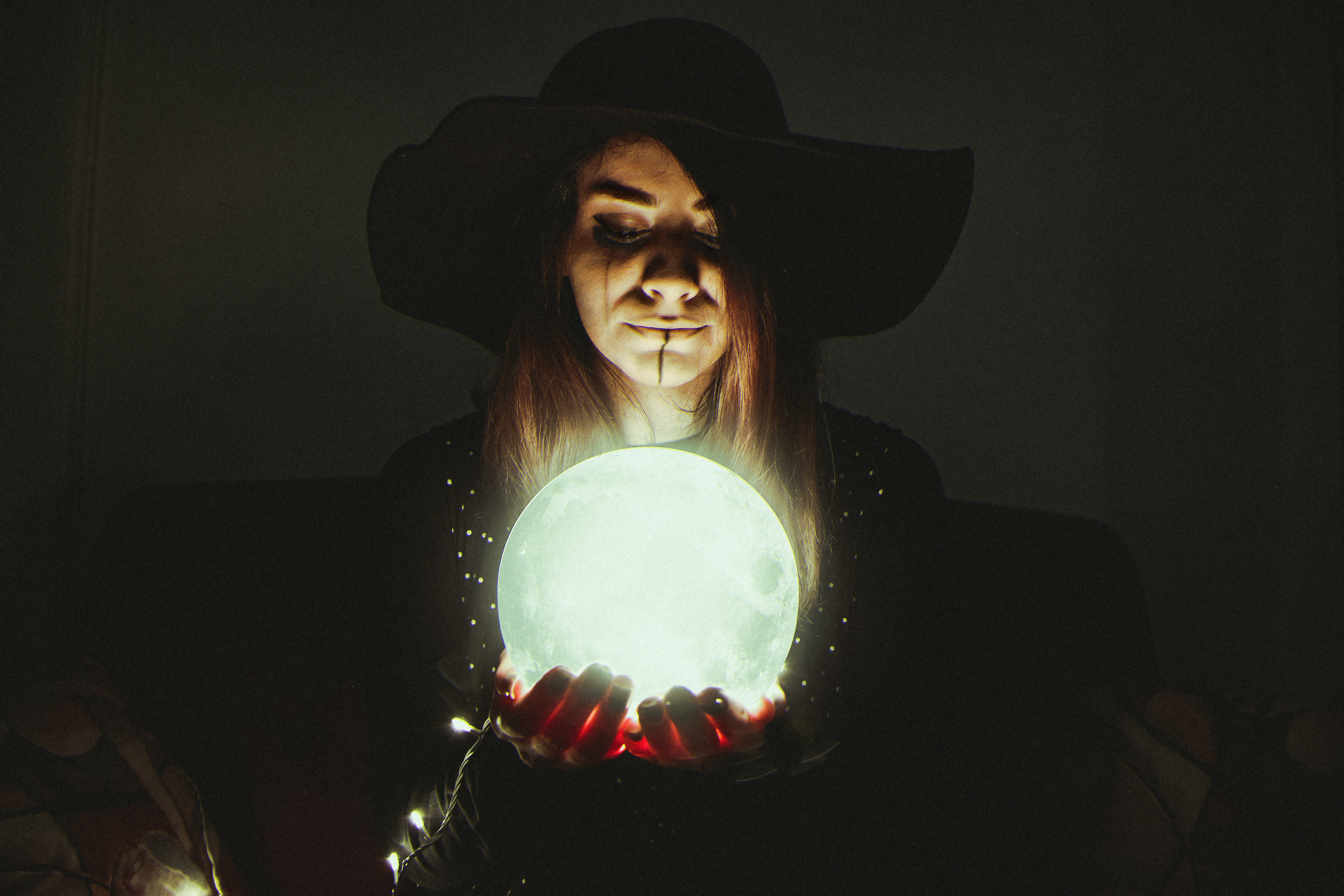 Woman holding crystal ball photo – Free Human Image on Unsplash