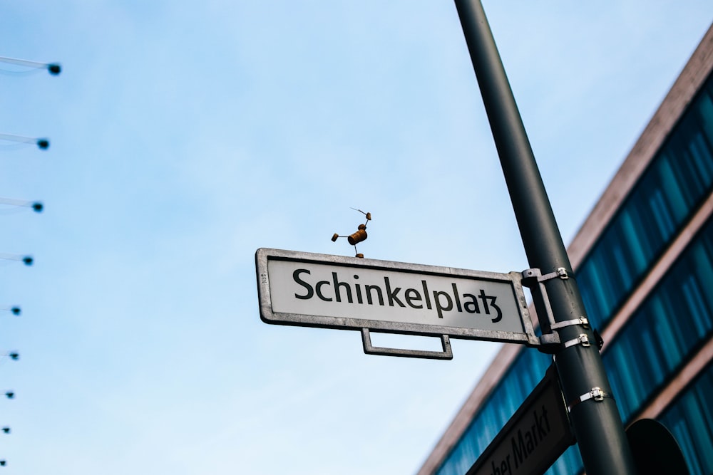 white Schinkelplatz signage