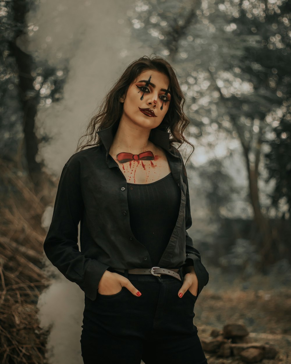 standing woman wearing Halloween makeup