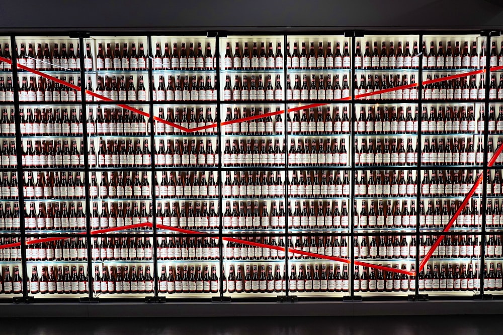 row of refrigerators full of beer