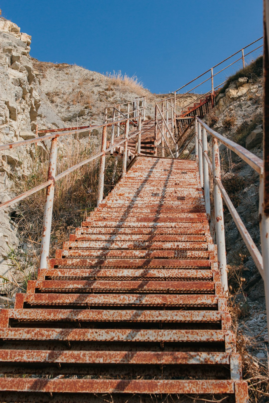 grey metal staircase during daytime
