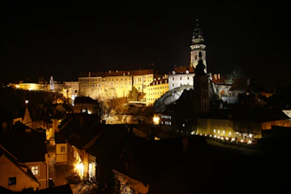 A warm, inviting photo of Congleton Town Hall lit up at dusk, welcoming visitors.