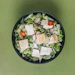 green salad on a black bowl