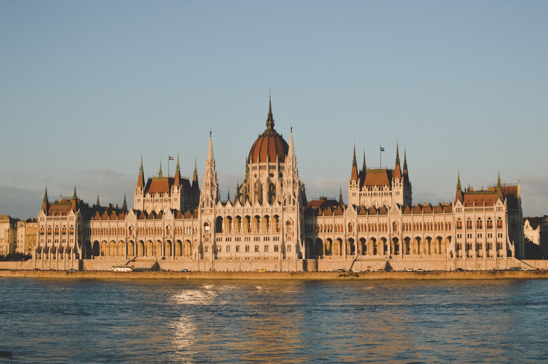 brown and beige dome building near sea