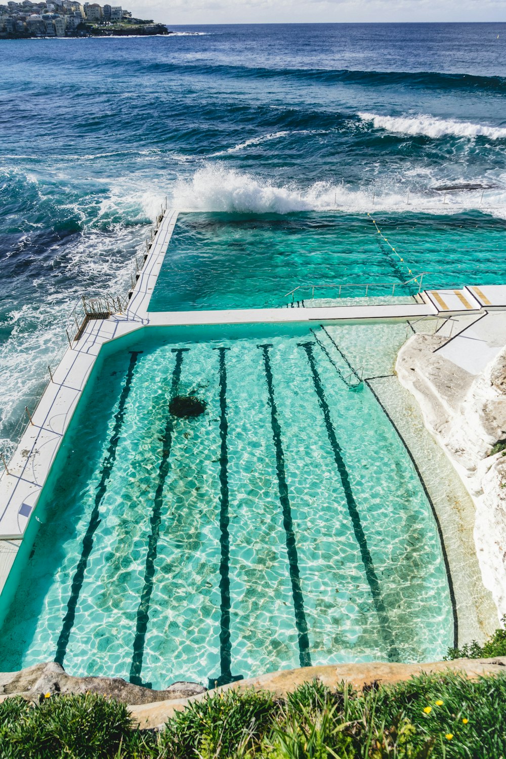 infinity pool in front of beach