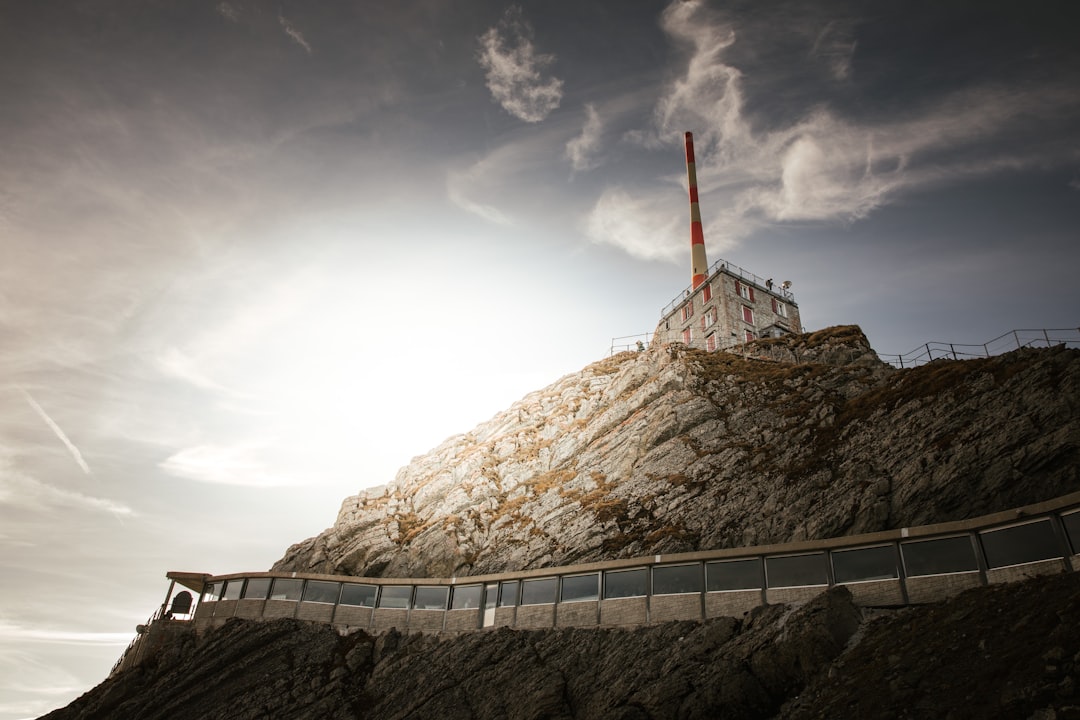 concrete building on top of rock formation