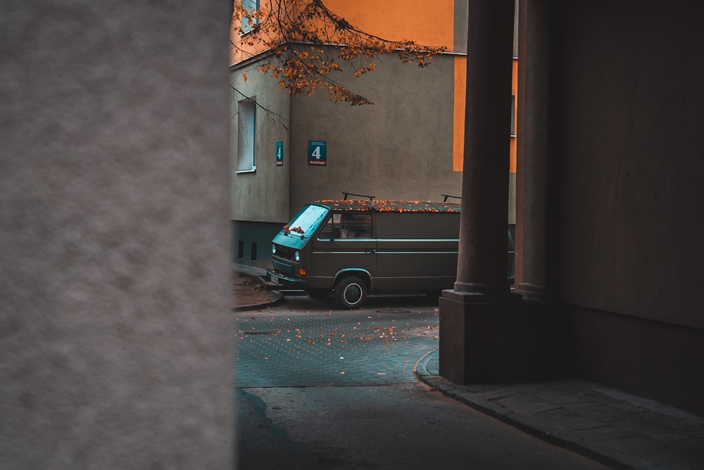 brown bus near brown building