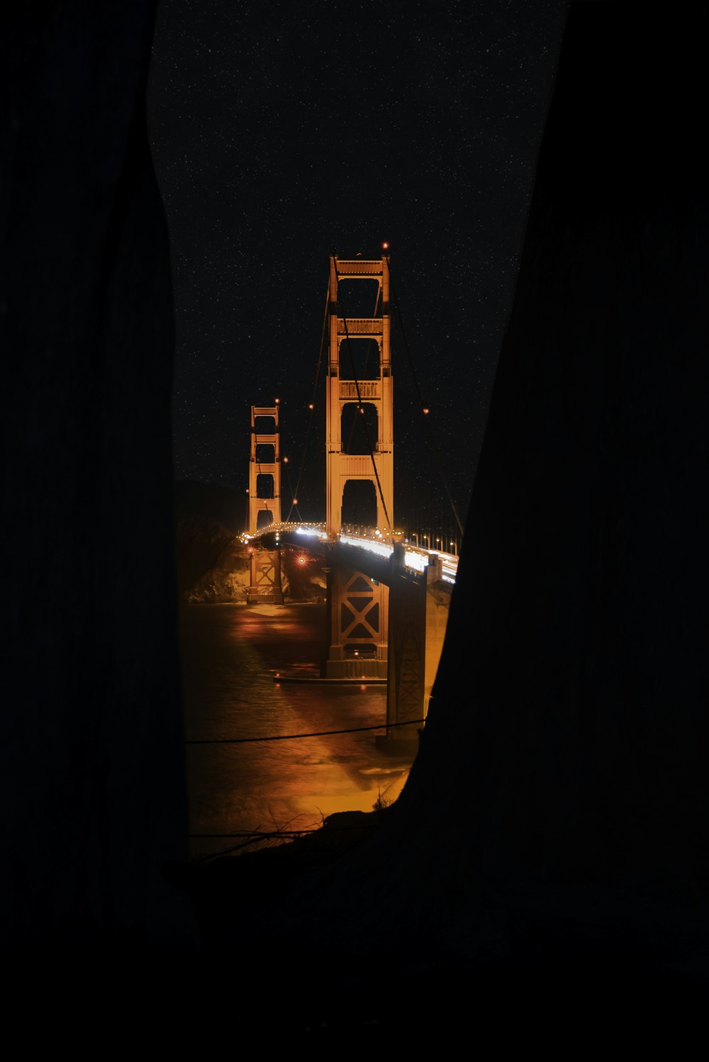 lighted bridge during nighttime