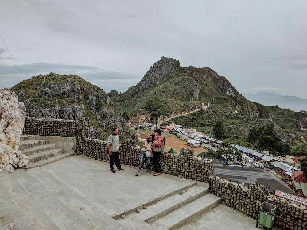 woman and men taking photo