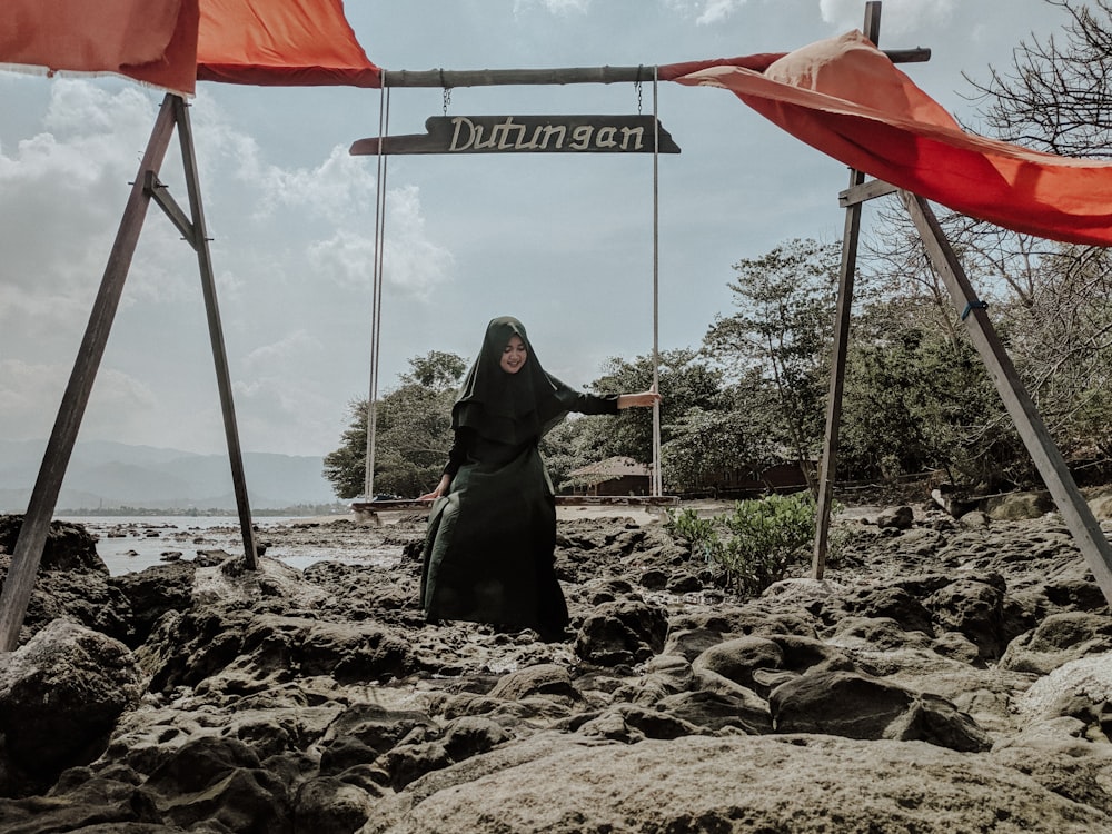 woman on swing at beach