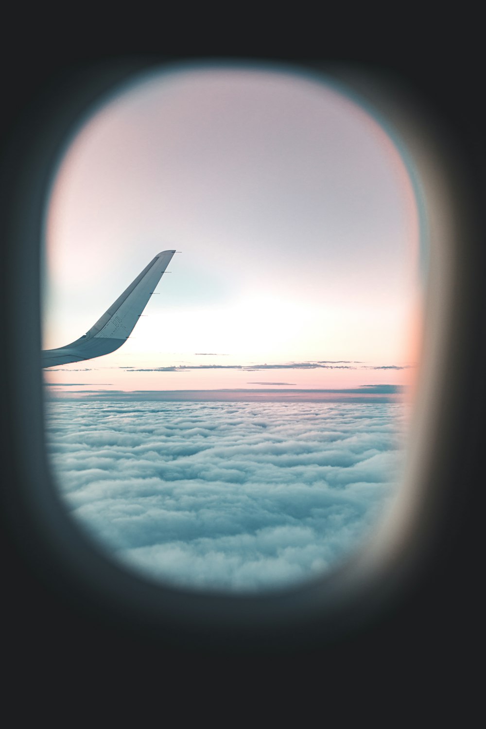 airplane over bed of clouds