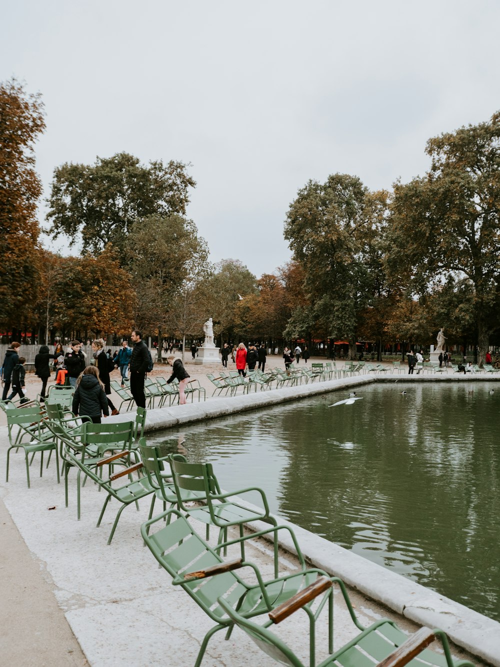 man walking near the body of water