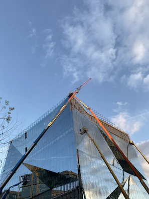 Modern residential building under construction in northern Mexico with clear blue sky.
