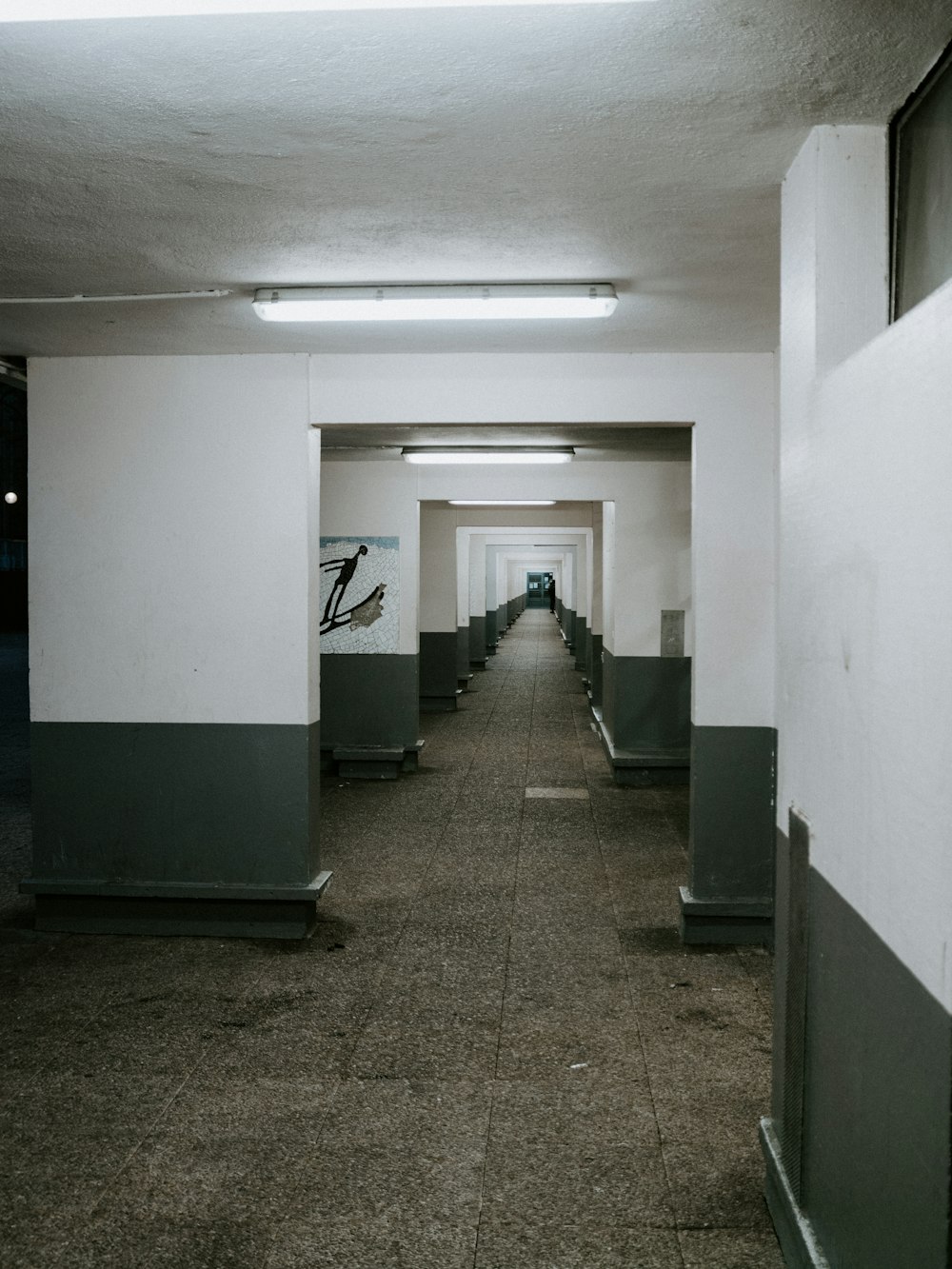 gray and white hallway of a building