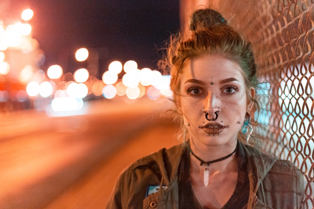 woman with nose piercing at nighttime