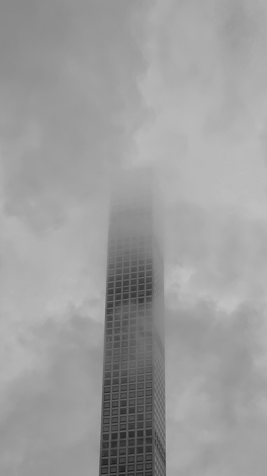 grayscale photography of high-rise building