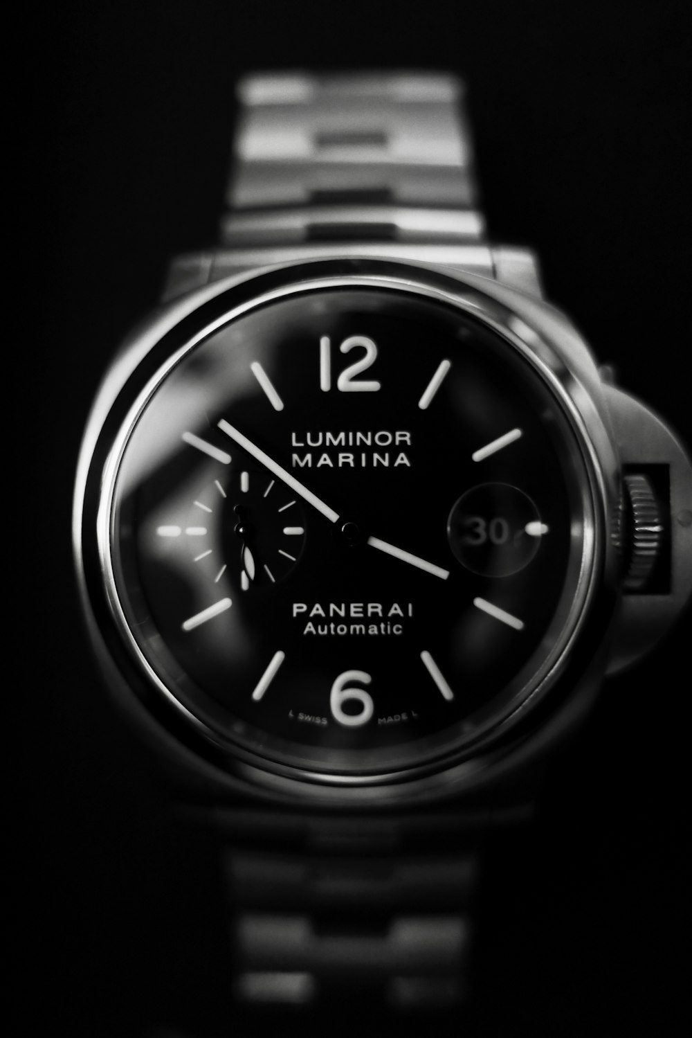 grayscale photography of round Luminor Marina Panerai chronograph watch
