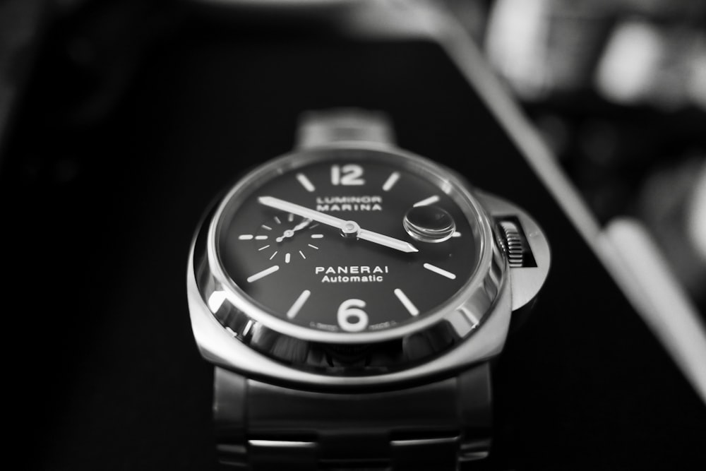 grayscale photography of round Panerai chronograph watch