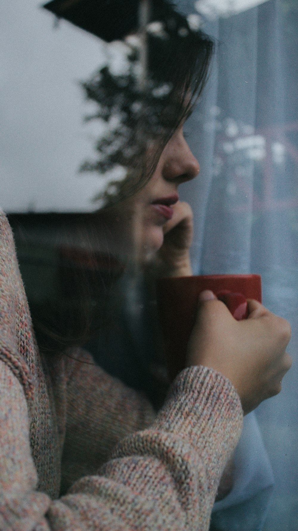 woman holding mug