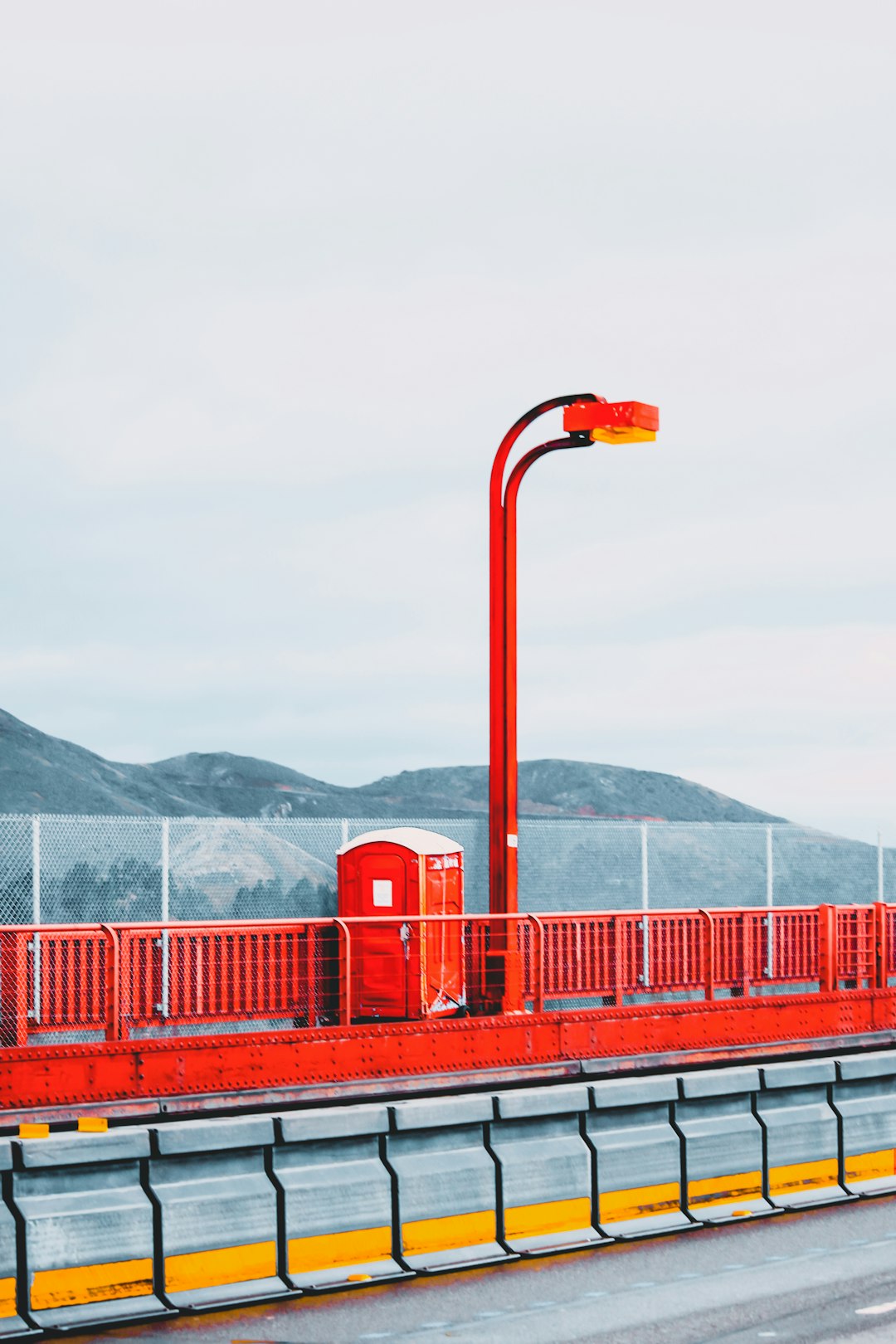 red payphone near road