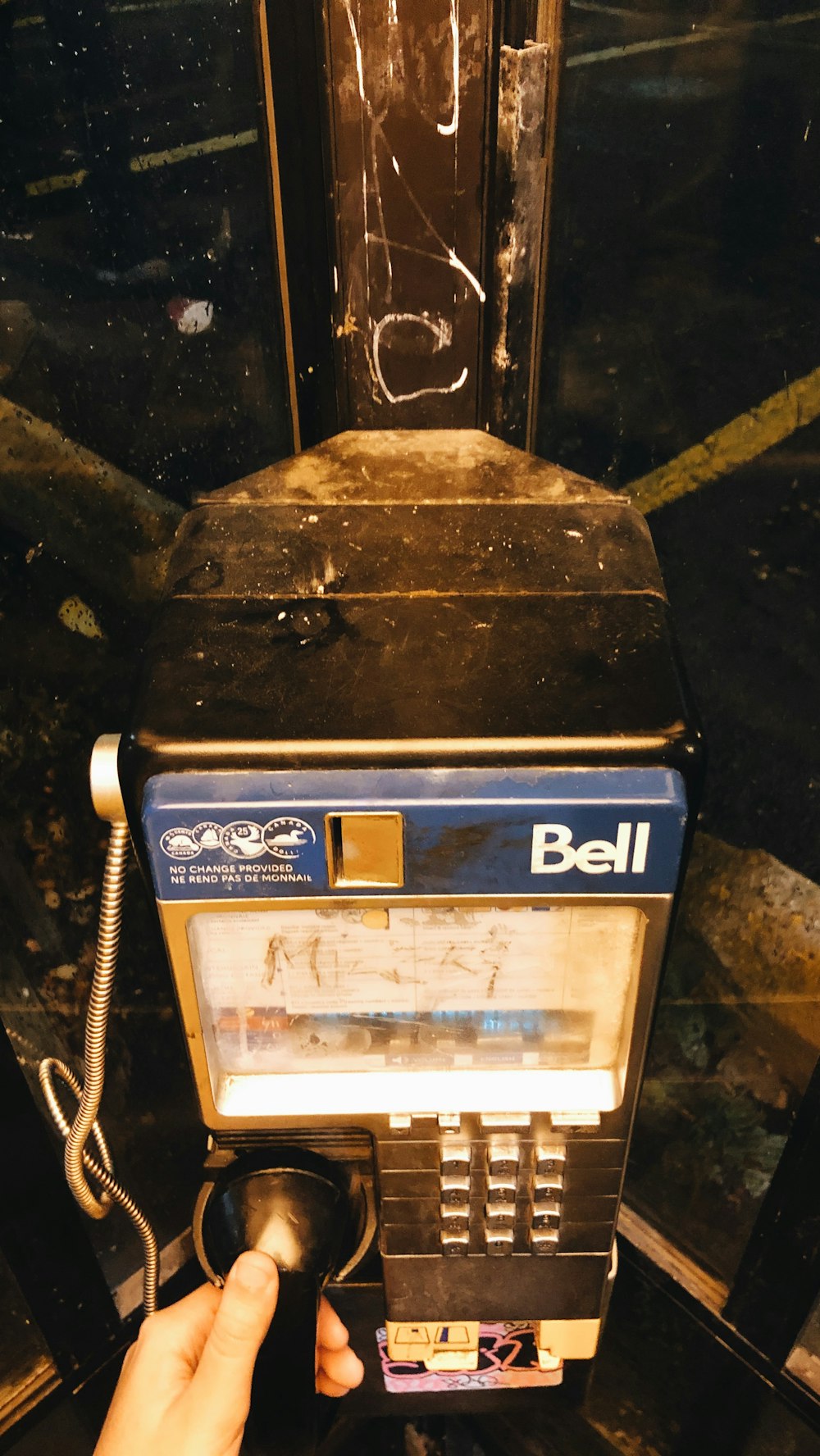 white and blue bell telephone