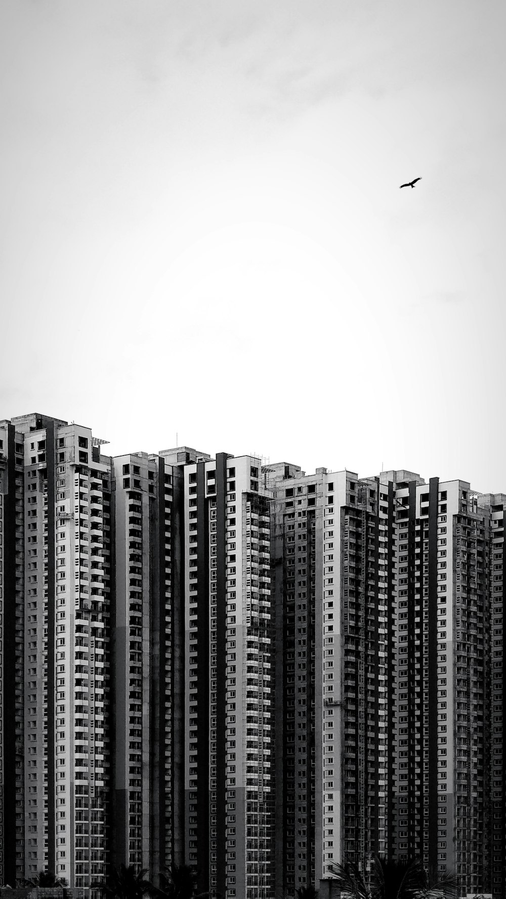 grayscale photography of high-rise building